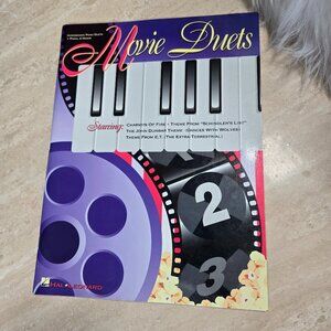 MOVIE DUETS: INTERMEDIATE PIANO DUETS - 1 PIANO, 4 HANDS By Hal Leonard Corp. VG